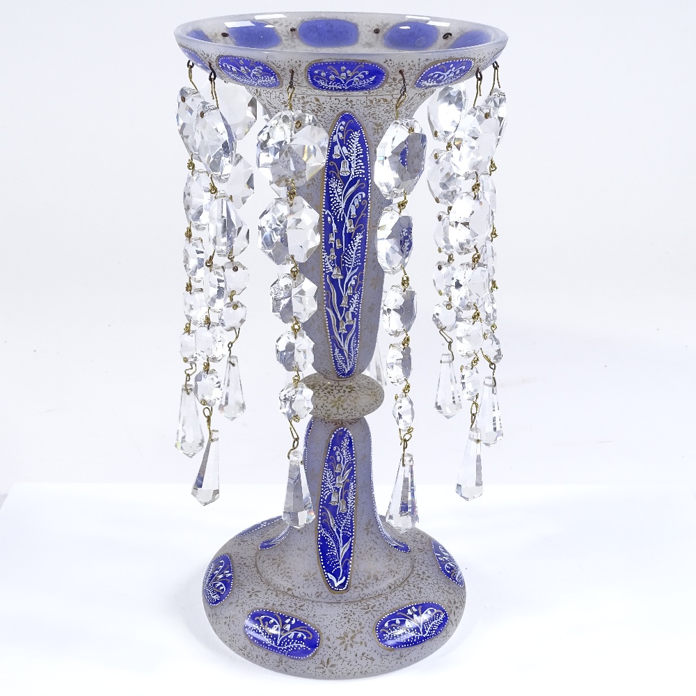 A 19th century gilded blue enamel table lustre with cut-glass drops, height 29cm