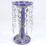 A 19th century gilded blue enamel table lustre with cut-glass drops, height 29cm