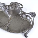 A WMF Art Nouveau relief-cast pewter desk stand with inkwell, width 23cm