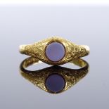 An 18ct gold agate seal ring, with floral engraved shoulders, setting height 9.4mm, size Y, 6.7g