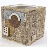 A Troika Cornwall Pottery cube vase with relief decorated abstract designs, signed under base,