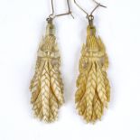 A pair of relief carved ivory wheatsheaf drop earrings, height excluding fitting 45.1mm