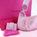 An Escada pink leather handbag and purse, with dust bags and boxes