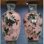 A pair of Oriental pink ground cloisonne vases, with designs of birds and flowers, height 13.75"