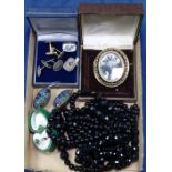 A quantity of Vintage jewellery, to include a 19th century gilt-metal memorial brooch with hair