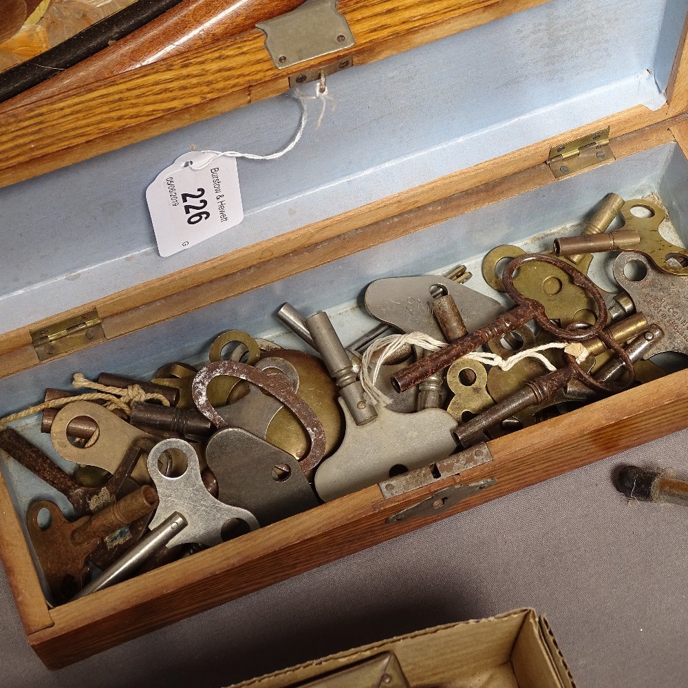 An oak box full of keys