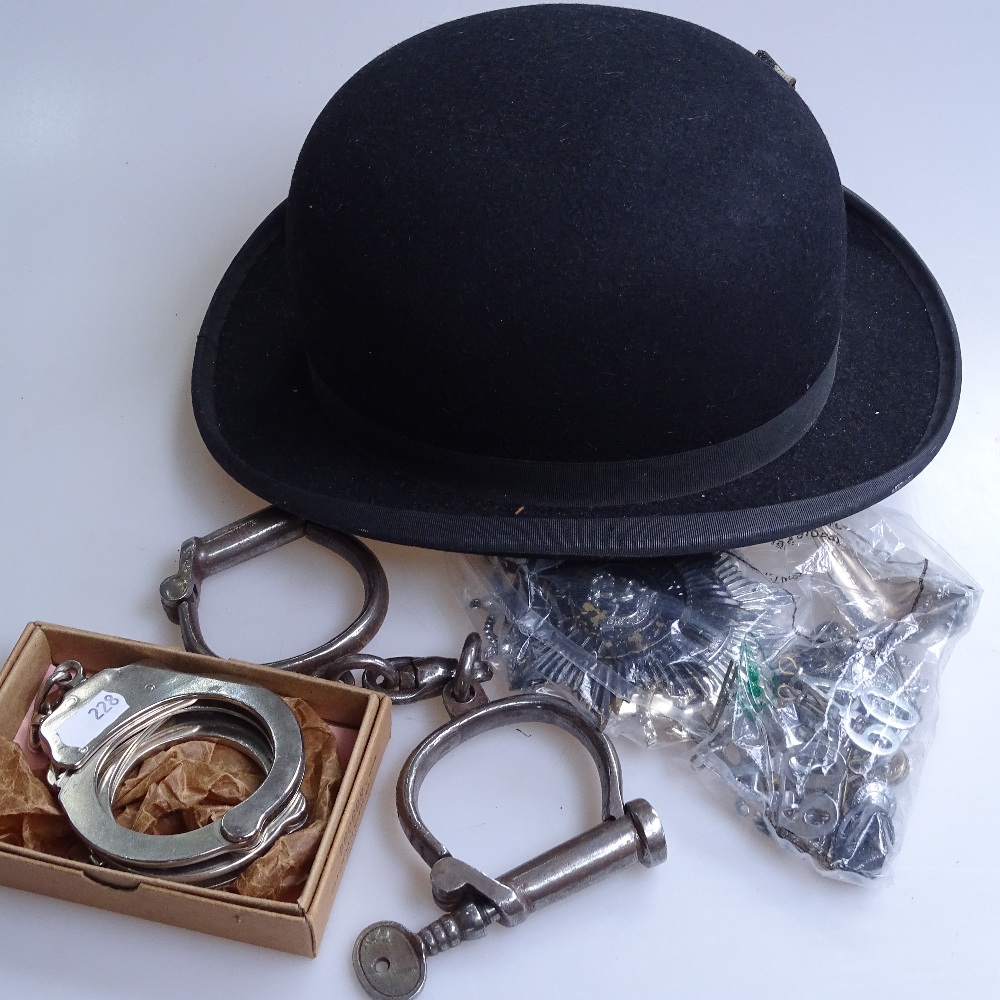 A Lock & Co bowler hat, goggles, police badges, handcuffs etc - Image 2 of 2