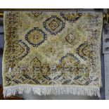 A Persian silk rug with symmetrical pattern, 100cm x 65cm