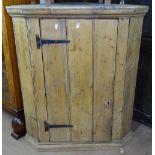 An Antique pine hanging corner cupboard, single door, W80cm