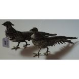 A pair of silver plated table pheasants