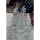 Various crystal decanters and stoppers, and glasses