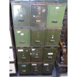 A bank of 12 industrial metal filing drawers, W73cm, H147cm