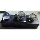 3 boxed Caithness paperweights, North Sea and Nomad with certificates, and Whirlpool no. 1/1