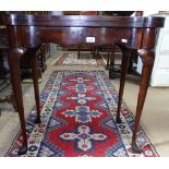 A mahogany fold over tea table of shaped form, in Georgian style, raised on cabriole legs, W76cm