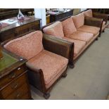 A 1930s mahogany-framed and double cane-panelled Bergere suite, comprising of 3-seater settee and