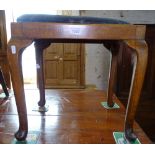 An Edwardian upholstered dressing stool, on cabriole legs, W47cm