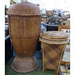An Oriental woven and cane-work laundry basket, height 31", and a smaller basket