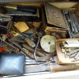 A shelf with 3 trays of various tools, including watch and clock maker's items, and 2 boxes of