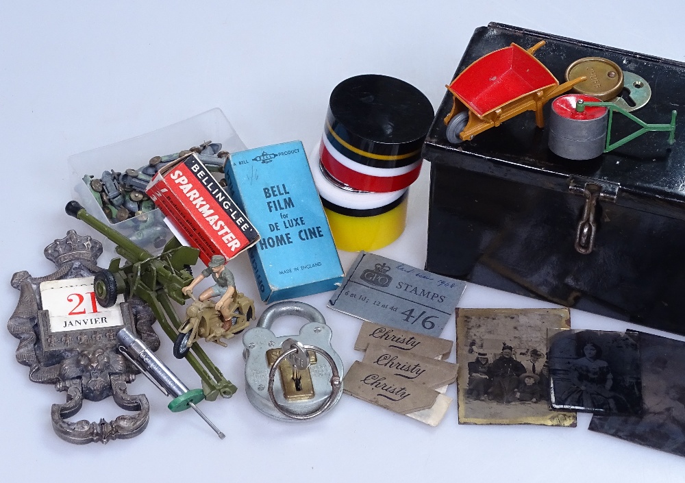 A French perpetual calendar, a table lighter, miniature diecast racing cars, photographs etc