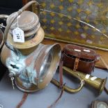 A copper Dietz lantern, a brass car horn, and binoculars in case