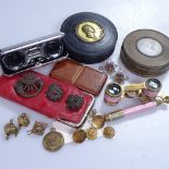 Enamelled opera glasses, Regimental and other badges, a leather card case etc