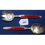A pair of Norwegian 925 sterling silver and red enamel salad spoons