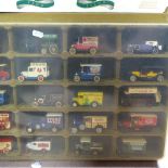 3 vanity cases with lighters, ornaments etc, and a display of Lledo toy cars