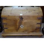 A Continental pine dome-top trunk, with steel bounds, inset floral panel, on bun feet, W78cm