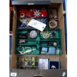 A tray containing costume jewellery, wristwatches etc