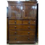 A Victorian mahogany 2-section linen press, the base fitted with 5 drawers on bun feet, W120cm