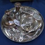 A tray of silver plated items, to include 2 sets of 6 tea and coffee spoons, sugar tongs, pickle