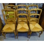 A set of 6 French ladder-back rush-seated dining chairs