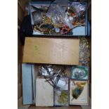 A large quantity of mixed costume jewellery, wristwatches etc