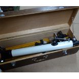 A Japanese telescope with adjustable wooden tripod stand, in wooden case