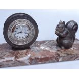 An Art Deco clock on marble stand with spelter squirrel, length 12.5"