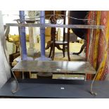 A painted metal 2-tier stand on scrolled legs, W100cm
