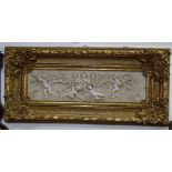 A composite cherub wall plaque in relief embossed gilt frame, W120cm, H55cm