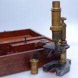An Antique mahogany-cased brass microscope with accessories, by J H Steward, 66 Strand, case
