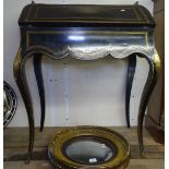 A 19th Continental ebonised and brass inlaid lady's writing desk, having a pierced brass gallery,