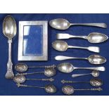 7 various silver teaspoons, a rectangular silver-fronted photo frame, and a set of 6 Indian white