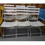 A set of 7 painted metal folding garden chairs