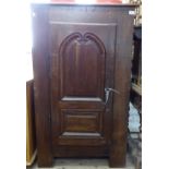 An Antique oak cupboard, with single fielded panelled door, W80cm, H132cm