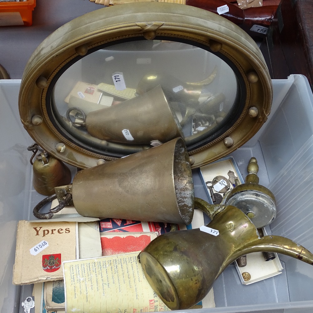 A circular convex mirror, 12.25", a coffee pot, 2 bells, and ephemera