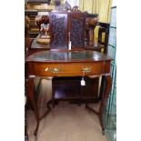 An Art Nouveau mahogany lady's writing desk, having a raised 2-door cupboard with fitted interior,
