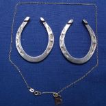 A 9ct gold pendant and chain, and a pair of silver horseshoe design pendants