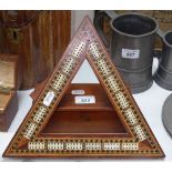 A triangular inlaid cribbage board, and a box of bone and ebony dominos