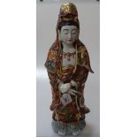 A Japanese painted and gilded porcelain standing figure, height 43cm