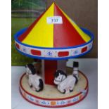 A painted model carousel, boxed