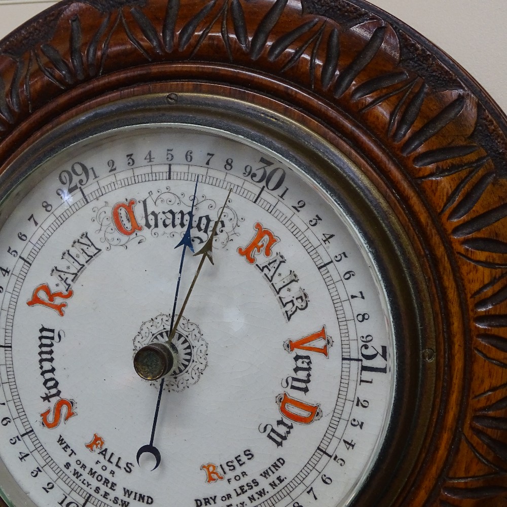 An aneroid barometer set in carved mahogany frame, diameter 8.5" - Image 2 of 2