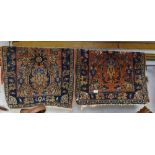 A pair of red ground Persian design mats, 90cm x 65cm